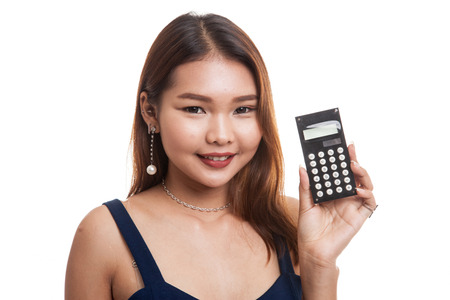 Asian woman smile with calculator isolated on white backgroundの写真素材