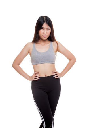Asian strong healthy  girl  in sport dresses isolated on white backgroundの写真素材