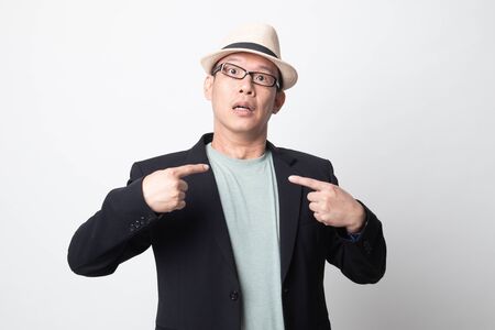 adult asian man  point at himself ask why me on white backgroundの写真素材