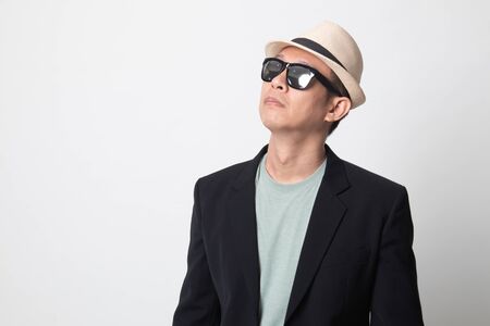 Portrait of an adult asian man  in sunglasses on white backgroundの写真素材