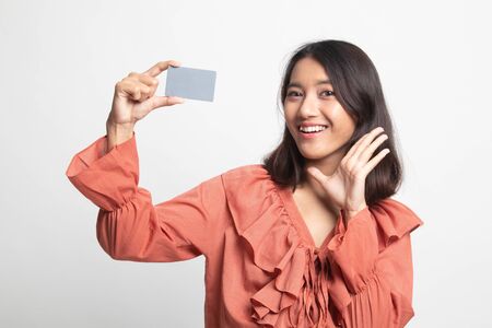 Young Asian woman happy with  blank card on white backgroundの写真素材