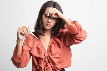 Young Asian woman got sick and flu on white backgroundの写真素材