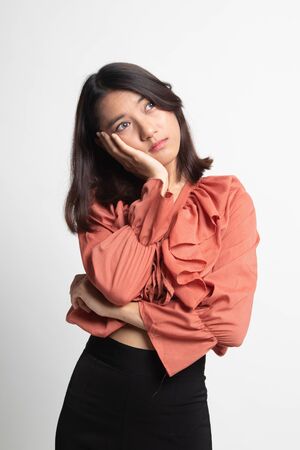 Beautiful young Asian woman get bored on white backgroundの写真素材