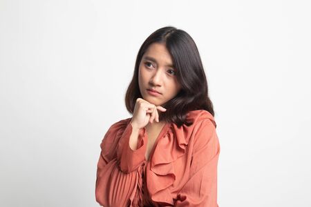 Serious  young Asian woman  look away on white backgroundの写真素材