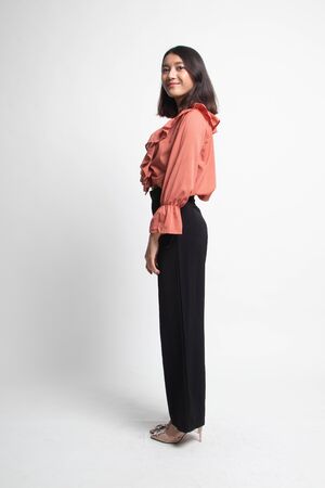 Side Full body of beautiful young asian woman on white backgroundの写真素材