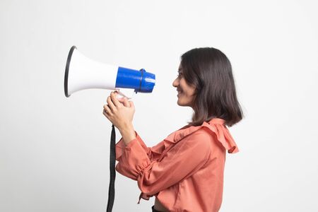 Beautiful young Asian woman announce with megaphone on white backgroundの写真素材