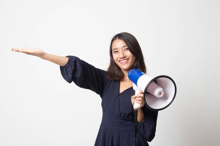 Beautiful young Asian woman announce with megaphone on white backgroundの写真素材