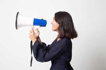 Beautiful young Asian woman announce with megaphone on white backgroundの写真素材