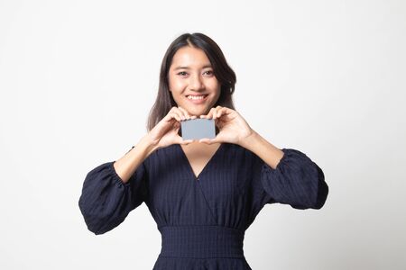 Young Asian woman smile with blank card on white backgroundの写真素材
