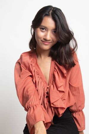 Portrait of beautiful young Asian woman on white backgroundの写真素材