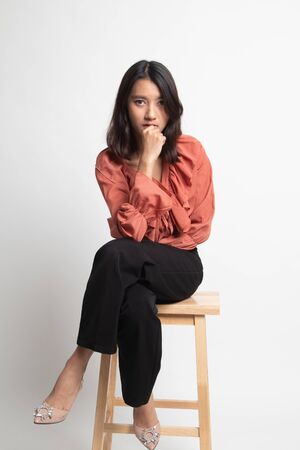 Portrait of beautiful young Asian woman on white backgroundの写真素材