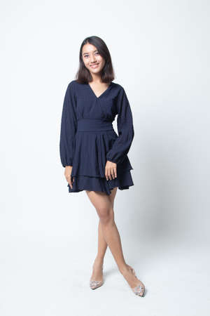 Full body of beautiful young asian woman on white backgroundの写真素材