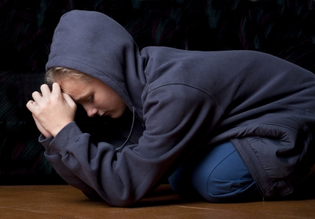 Sad teenager is in depression.の写真素材