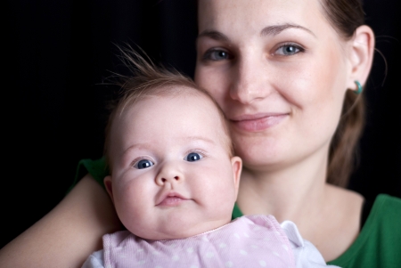 Little baby is having fun with mother.の写真素材