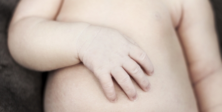 Little newborn girl is sleeping.の写真素材