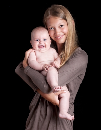 Three months old baby has lot of fun の写真素材