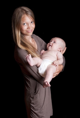 Three months old baby has lot of fun の写真素材