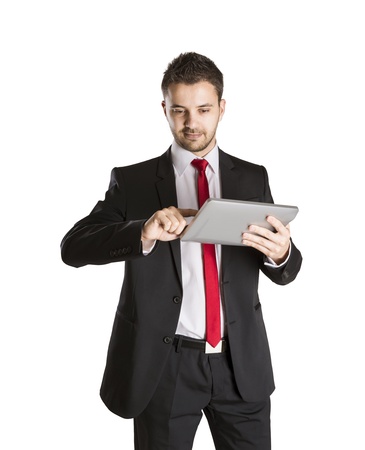 Successful business man is standing on isolated white backgroundの写真素材