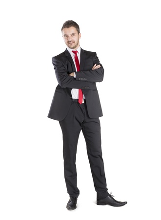 Successful business manager is standing on isolated white backgroundの写真素材