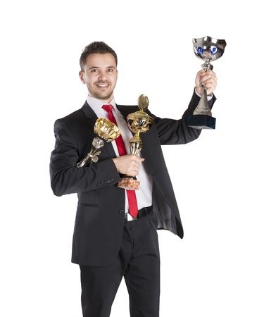 Successful business man is celebrating success on isolated white backgroundの写真素材