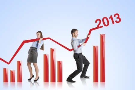 Business woman is trying to increase market statistics の写真素材