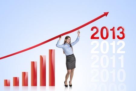 Business woman is trying to increase market statistics の写真素材