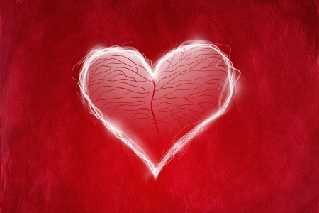 Love concept with heart on red abstract background の写真素材