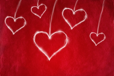 Love concept with heart on red abstract background の写真素材