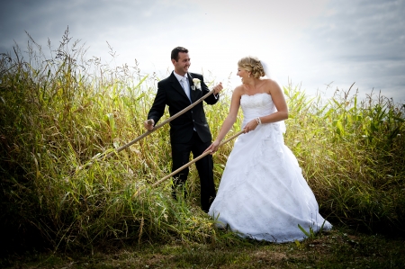 Bride and groom are posing outdoorsの写真素材