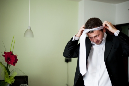 Groom is getting ready for the weddingの写真素材