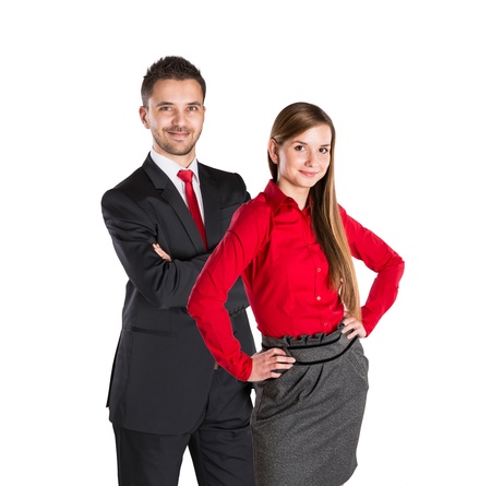 Successful business couple is standing on isolated background.の写真素材