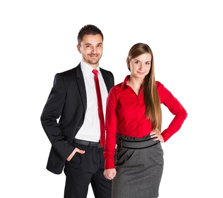 Successful business couple is standing on isolated background.の写真素材