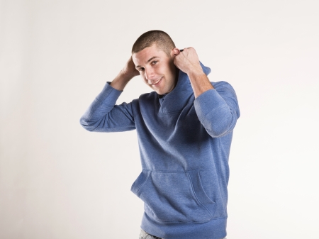 Stylish young man posing isolated on white background.の写真素材