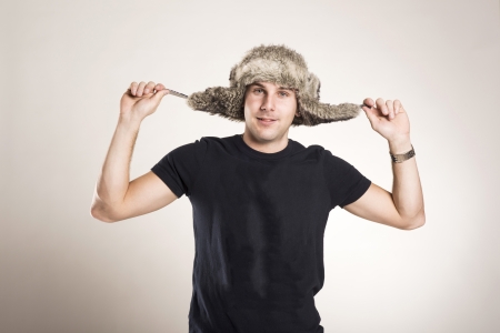 Stylish young man posing isolated on white background.の写真素材