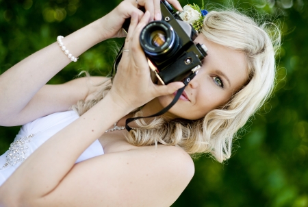 Beautiful bride is enjoying her wedding dayの写真素材