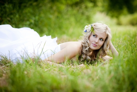 Beautiful bride is enjoying her wedding dayの写真素材