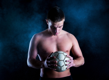 Young fitness model is posing in studioの写真素材