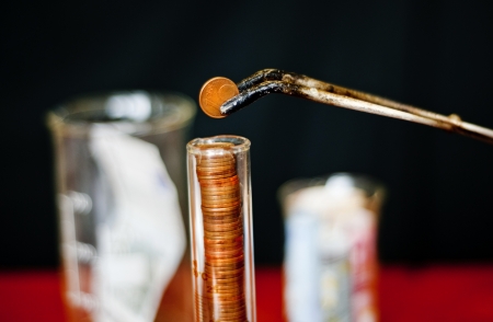 Unsual chemical experiment with money の写真素材