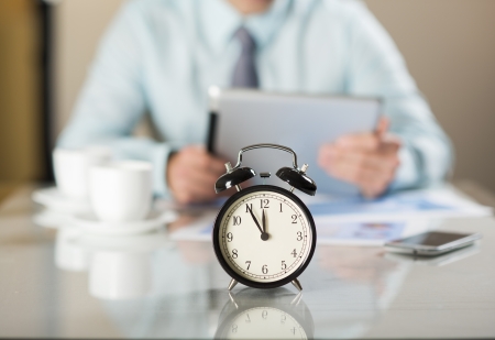 Businessman in office has problem with deadlineの写真素材
