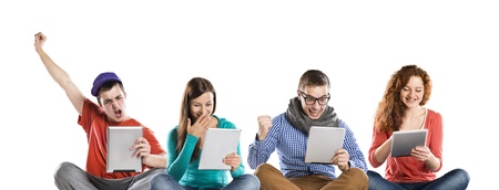Beautiful young people with tablet in studio