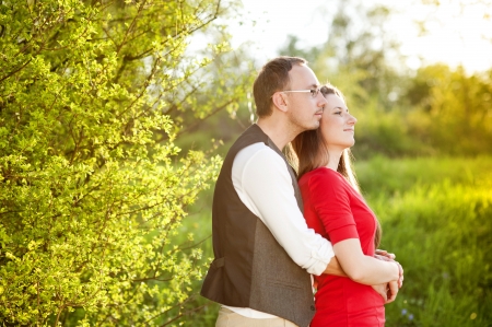 Happy couple is having romantic time in natureの写真素材