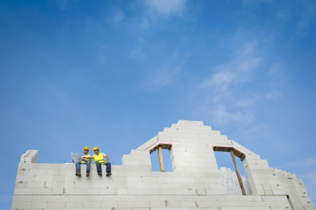 Construction Contractors building a big new homeの写真素材