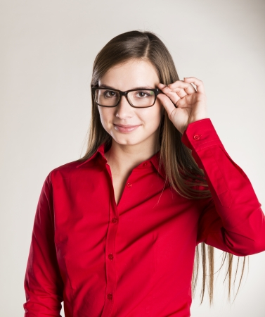 Successful business woman is posing in studioの写真素材