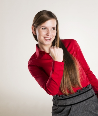 Successful business woman is posing in studioの写真素材