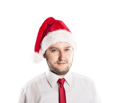 Handsome christmas man is posing in studioの写真素材