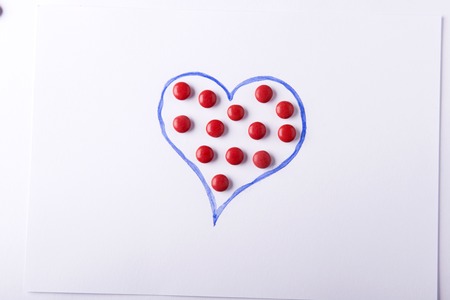 Studio concept with small round colorful candiesの写真素材