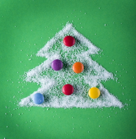 Studio concept with small round colorful candiesの写真素材