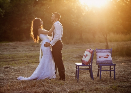 Beautiful bride and groom portrait in natureの写真素材