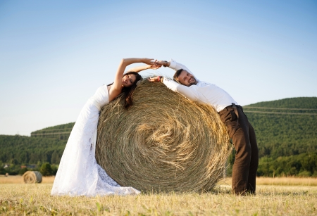 Beautiful bride and groom portrait in natureの写真素材