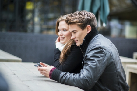 Hapy couple is having date in the street of cityの写真素材